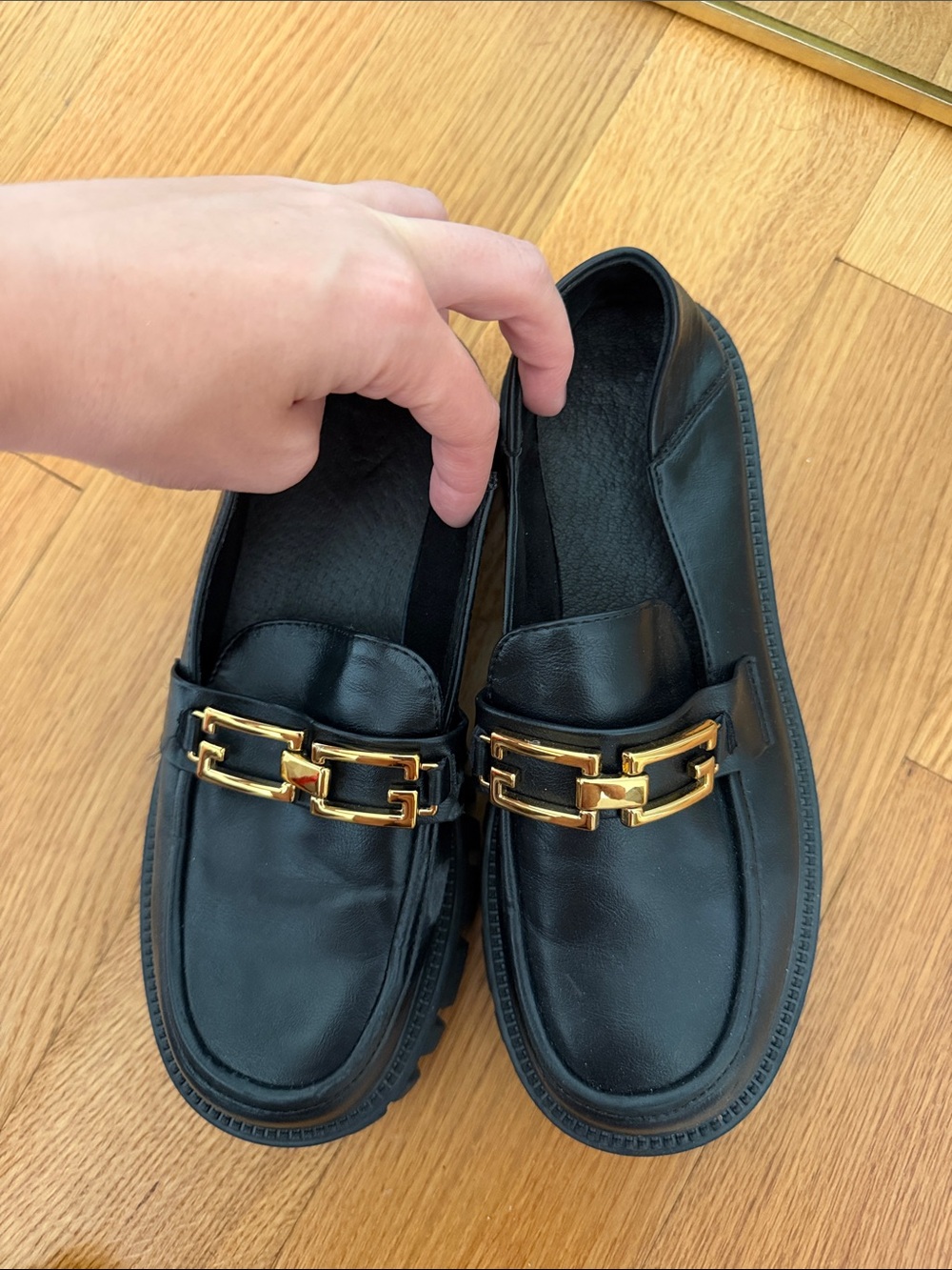 Women’s Black Leather Slip-On Loafers with Gold Hardware